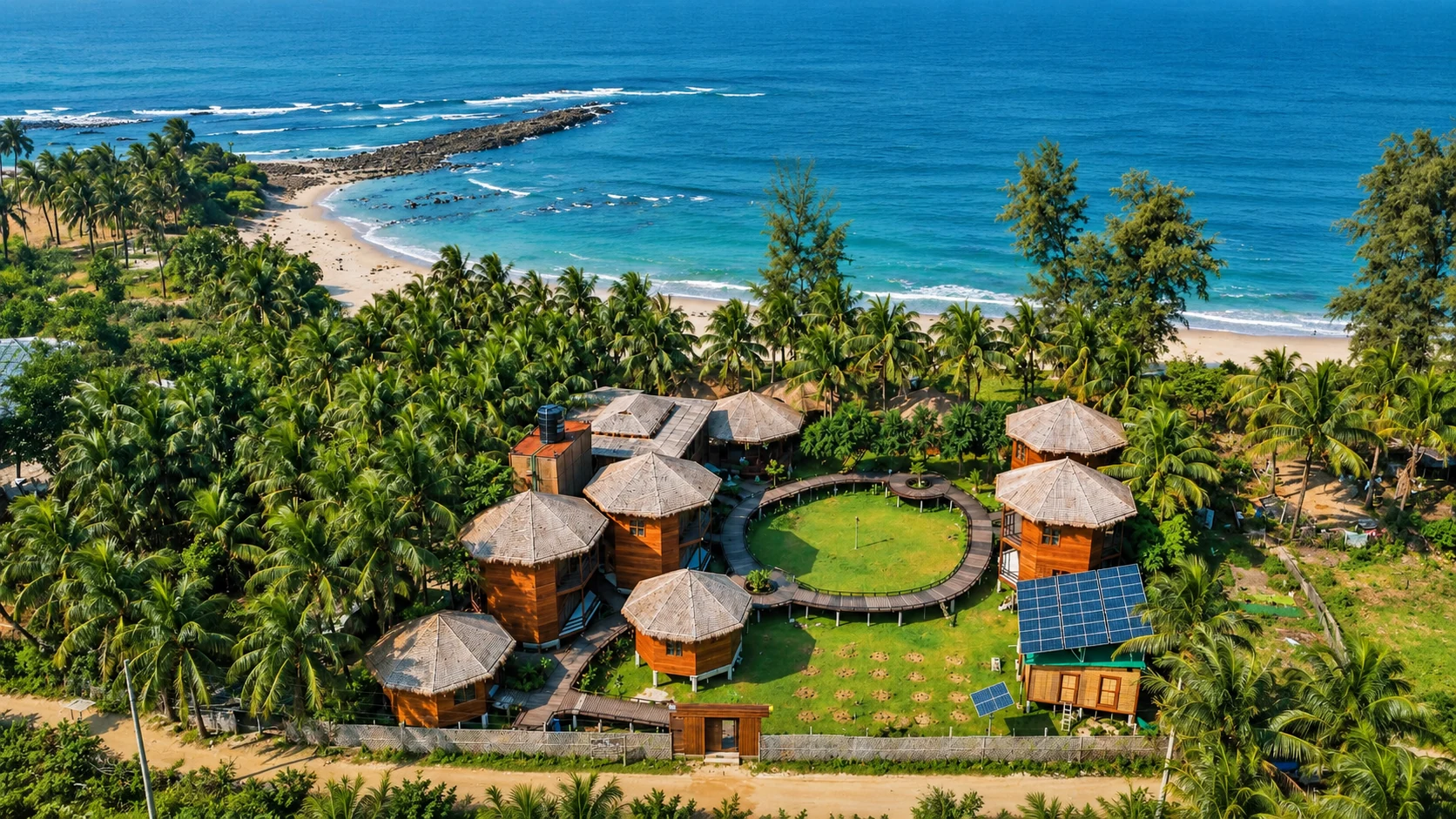 Aerial view of LuiPaz Resort beside the palm-lined beach on Saint Martin’s Island